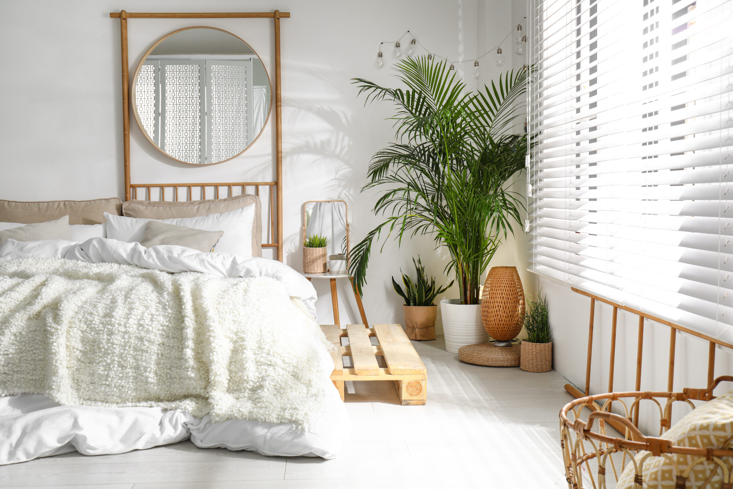 Stylish modern room interior with comfortable bed Stylish modern room interior with comfortable bed